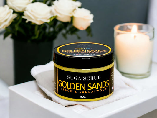In this photo, there Is a jar of “Golden Sands” Sugar Scrub, scented with warm Peach & Sandalwood.
