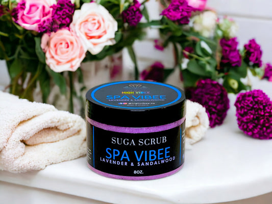 In this photo, there Is a jar of “Spa Vibee” Sugar Scrub, scented with Lavender & Sandalwood.