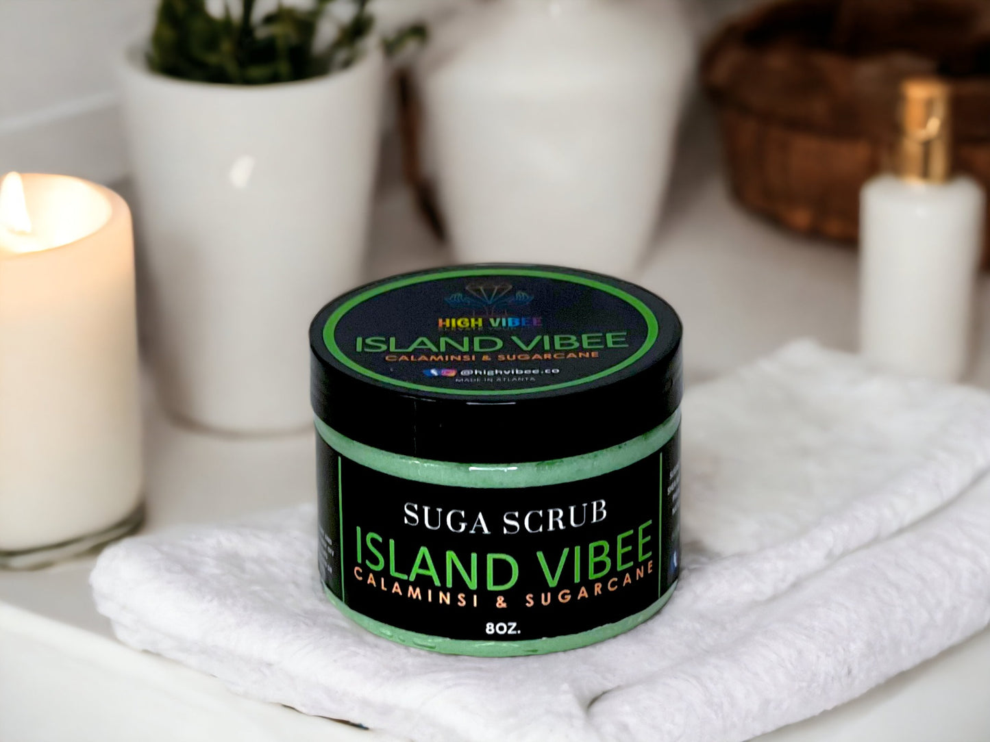 In this photo, there Is a jar of “Island Vibee” Sugar Scrub, scented with warm Calamansi & Sugarcane.