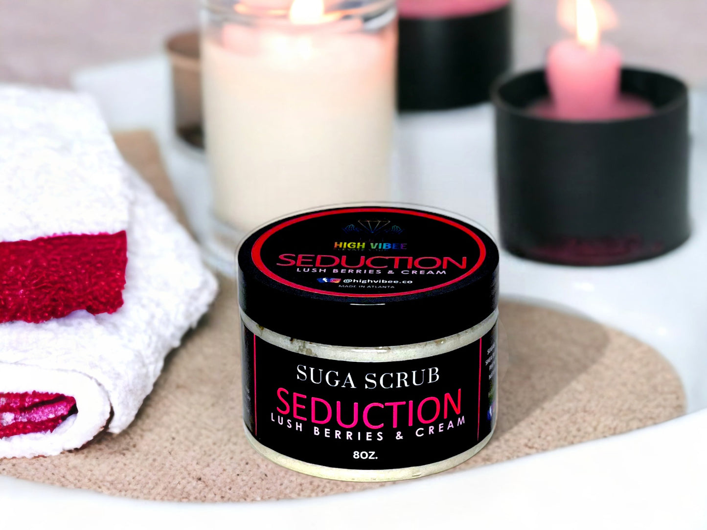 In this photo, there Is a jar of “Seduction” Sugar Scrub, scented with Lush Berries & Cream.