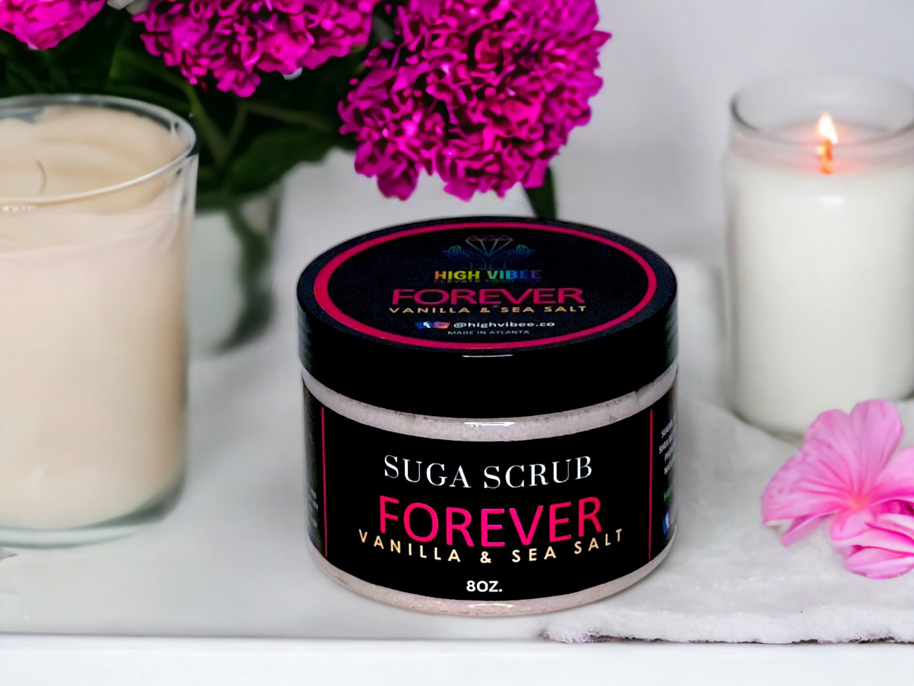 In this photo, it shows the highly sought after "Forever" Sugar Scrub scented with Vanilla & Sea Salt from High Vibee.