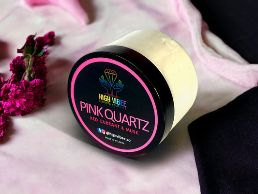  In this photo, there is a jar of High Vibee's “Pink Quartz” Body Butta scented with Red Currant & Musk.